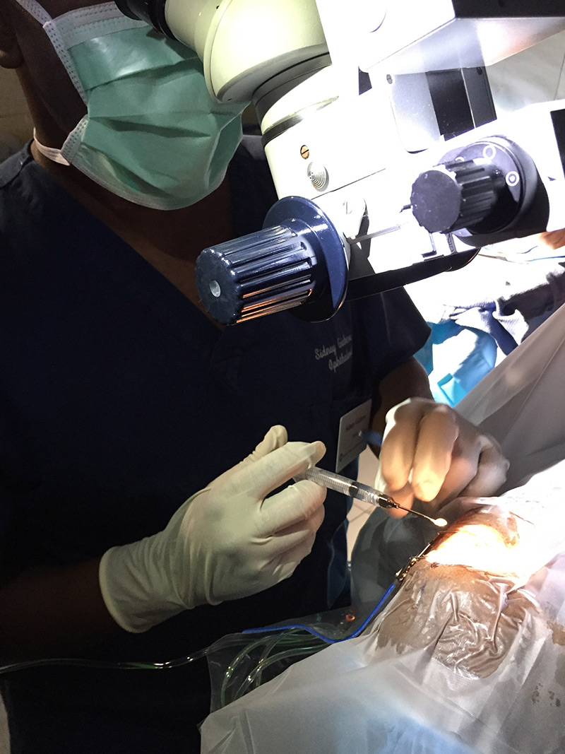 Dr. Gicheru operating in Haiti.